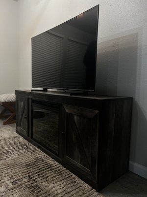 Fireplace TV Stand Assembly - Successfully assembled a Fireplace TV Stand, meticulously securing each component for optimal functionality and aesthetic appeal. The attention to detail resulted in a seamless and durable entertainment unit, providing a satisfying and lasting solution for the client. Fireplace TV Stand Assembly - Successfully assembled a Fireplace TV Stand, meticulously securing each component for optimal functionality and aesthetic appeal. The attention to detail resulted in a seamless and durable entertainment unit, providing a satisfying and lasting solution for the client.