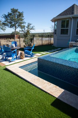 Pools with Artificial Turf - If you have a pool, you need artificial turf! Spend less time skimming dirt and debris from your pool and stop rinsing off wet, muddy feet! Your pool isn't looking its best surrounded by dead, brown grass, either. Artificial turf will make your pool look luxe, whether it's in or above ground! Contact us for a FREE estimate! Pools with Artificial Turf - If you have a pool, you need artificial turf! Spend less time skimming dirt and debris from your pool and stop rinsing off wet, muddy feet! Your pool isn't looking its best surrounded by dead, brown grass, either. Artificial turf will make your pool look luxe, whether it's in or above ground! Contact us for a FREE estimate!