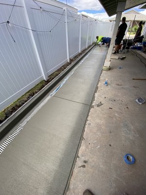 Concrete Driveway Extension - Concrete driveway extension with drain channel and sidewalk