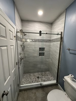 Norfolk Bathroom remodel - We tore out the old fiberglass tub ensemble and installed a new custom shower and paint. We also updated all the other fixtures as well Norfolk Bathroom remodel - We tore out the old fiberglass tub ensemble and installed a new custom shower and paint. We also updated all the other fixtures as well
