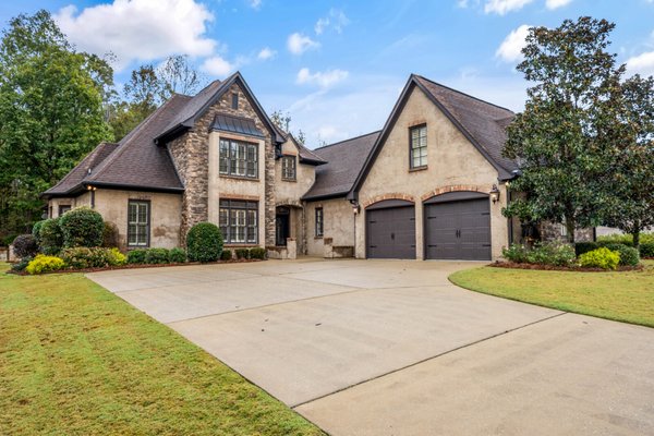 Chelsea Listing - This gorgeous 5-bedroom 4 bath, zero-step threshold entry, all-brick home offers the perfect blend of comfort, versatility, and style in one of the area’s most desirable communities! The flexible floor plan includes two bedrooms on the main level!
