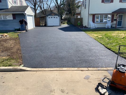 New asphalt driveway before/after - old driveway taken out new sub base installed and 3 inch of hot asphalt layed and compacted