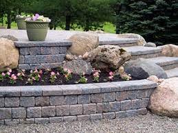 "Hardscapes" - At Prime Green, we offer a comprehensive range of services, catering to residential, commercial, and industrial clients alike. From decorative concrete, stamped patterns, and polished finishes to foundation work, driveways, and retaining walls, our tailored solutions are designed to stand the test of time."