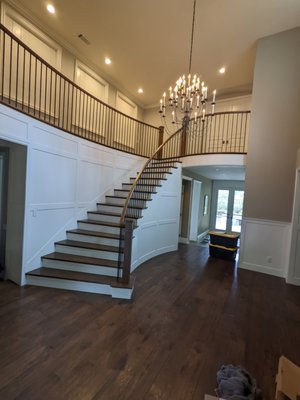 Clean lines to a traditional staircase - Changed out carpet and end treads to full treads and risers