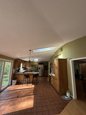 Popcorn removal/Paint - This kitchen had ice dam water damage. I patched the areas, removed the popcorn, painted walls, ceiling, and trim. I also did the tv room/mud room Popcorn removal/Paint - This kitchen had ice dam water damage. I patched the areas, removed the popcorn, painted walls, ceiling, and trim. I also did the tv room/mud room