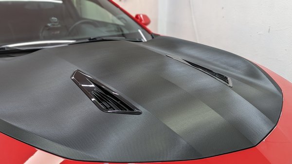 Hood Wraps - Would you like to add a sleek aggressive look to your car? A wrap from Flawless Detail can transform your ride into something new for a great price. We have over 600 colors and styles that you can choose from. We can wrap as little or as much as you like! Call us today and be driving the car of your dreams in no time.