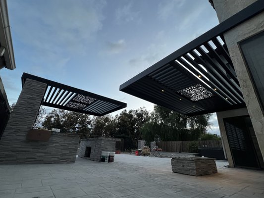 4K Aluminum Dual Espresso Cantilevers - Yorba Linda - Welcome to a lifestyle redefined in Yorba Linda with our exclusive 4K Aluminum Dual Espresso Cantilevers. One, a seamless house-attached Pergo-Soleil Patio Cover, harmoniously extending indoor living to the outdoors. The other, is a striking Pergo-Soleil No-Post Cantilever, defying gravity for unobstructed views. Experience luxury, durability, and design innovation in every detail.