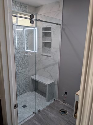 EuroGlide Frameless Glass Shower Doors - San Diego 2021 - EuroGlide Style Frameless Glass Shower Door Installation in San Diego.  Recently remodeled Bathroom.