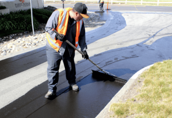 Sealcoating & Striping - Welcome to Calvac Paving, your trusted experts in sealcoating & striping services throughout California. With 50 years of industry expertise, we specialize in preserving and enhancing the longevity and appearance of asphalt surfaces through our meticulous sealcoating & striping services.