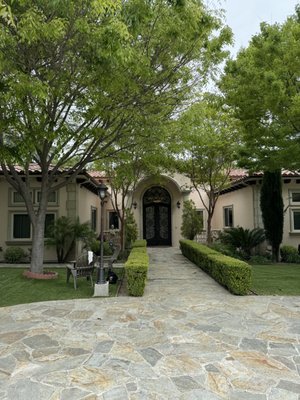 Residential Exterior Paint Project - Beautiful home with cracking and fading stucco refreshed by our paint team. Residential Exterior Paint Project - Beautiful home with cracking and fading stucco refreshed by our paint team.