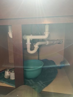Kitchen drain repipe due to in inadequate flow and leak - Re piped drain to have proper pitch and not to leak Kitchen drain repipe due to in inadequate flow and leak - Re piped drain to have proper pitch and not to leak