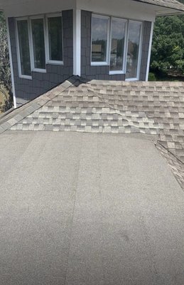 Rolled Roofing Repair - This is a major leak repair that was done on a flat rolled roofing project. All previous ducting was removed and replaced properly. New underlayment was added to protect against future leaks and rolled roofing was fully replaced. Rolled Roofing Repair - This is a major leak repair that was done on a flat rolled roofing project. All previous ducting was removed and replaced properly. New underlayment was added to protect against future leaks and rolled roofing was fully replaced.