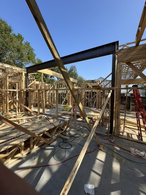 Beam installation on new construction home - This installation was done on a brand new house being built and everything is ready to go for the framers to build around it and give it more support. Beam installation on new construction home - This installation was done on a brand new house being built and everything is ready to go for the framers to build around it and give it more support.