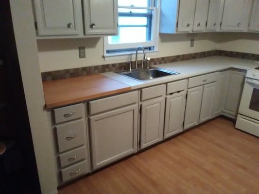 Kitchen upgrade on a dime Budget cost under $1500 - This Kitchen was in terrible shape and the customer wanted something done and didnt have a lot of money to work with because we were on her 4th project in her home so we came up with an upgrade idea, painted cabinets, replaced floor, new countertops and a quick paintjob all for under $1500 for labor Kitchen upgrade on a dime Budget cost under $1500 - This Kitchen was in terrible shape and the customer wanted something done and didnt have a lot of money to work with because we were on her 4th project in her home so we came up with an upgrade idea, painted cabinets, replaced floor, new countertops and a quick paintjob all for under $1500 for labor