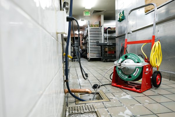 Commercial Hydro Jetting Service – San Francisco Restaurant Maintenance Job - At Hydro Plumbing & Rooter, we recently completed a commercial hydro jetting service in San Francisco for a restaurant that needed routine plumbing maintenance to keep its kitchen operations running efficiently. This project shows why hydro jetting is one of the best solutions for restaurants and commercial properties across the San Francisco Bay Area that deal with heavy grease, food debris, and high-volume drain usage.
About the Job
The client, a busy restaurant in San Francisco, CA, requested a scheduled maintenance hydro jetting service. Their kitchen plumbing and drain lines handle constant grease, oils, fats, and food particles every day. Even with regular best practices, commercial drains inevitably build up significant grease and scale, leading to slow drains, clogs, and unpleasant odors.
To avoid emergencies during peak hours, the restaurant scheduled preventive hydro jetting to restore water flow and keep their plumbing system reliable.
Our Hydro Jetting Process
Inspection: We started with a video camera inspection to check the condition of the restaurant’s drain and sewer lines. The inspection revealed grease accumulation typical in food service establishments.
High-Pressure Jetting: Using our commercial-grade hydro jetting equipment (up to 4,000 PSI), we blasted away grease, sludge, and food waste. Unlike snaking, hydro jetting cleans the entire pipe diameter.
Debris Removal: We cleared kitchen drains, floor drains, and the main sewer line, fully flushing out buildup and restoring proper flow.
Post-Jetting Check: A follow-up camera inspection confirmed the pipes were clean and free of blockages.
Maintenance Plan: We recommended hydro jetting every 6–12 months depending on usage, a common schedule for San Francisco restaurants.
Why Hydro Jetting is Ideal for Restaurants
1. Removes grease and sludge that build up daily.
2. Prevents costly clogs and backups.
3. Improves drain performance and eliminates odors.
4. Extends pipe lifespan by reducing corrosion and buildup.
5. Helps maintain compliance with San Francisco health codes.
Preventive Plumbing for Businesses
Restaurants in Downtown SF, Mission District, SoMa, Financial District, and Fisherman’s Wharf face unique plumbing challenges due to high traffic and aging infrastructure. Scheduling routine hydro jetting prevents emergencies, avoids business downtime, and saves money on major repairs.
Service Area
While this job was completed in San Francisco, we provide commercial hydro jetting throughout the Bay Area, including Oakland, Daly City, South San Francisco, San Mateo, and the Peninsula. Our clients include:
- Restaurants & cafés
- Hotels & hospitality businesses
- Apartment complexes
- Schools & universities
- Commercial office buildings
Why Choose Hydro Plumbing & Rooter?
1. Local San Francisco expertise with older plumbing systems.
2. Commercial-grade hydro jetting equipment for deep cleaning.
3. Licensed, insured plumbers who work quickly and safely.
4. Flexible scheduling to minimize business disruption.
5. Preventive maintenance plans tailored to commercial clients.
Results of This Job
The restaurant’s plumbing system was restored to optimal condition, with grease and odors eliminated. Their management team now has peace of mind knowing their kitchen drains are ready to handle daily demand without interruptions.
This project highlights how hydro jetting helps San Francisco restaurants maintain reliable, efficient plumbing systems while protecting their bottom line.
Contact Us Today
If you own or manage a restaurant, café, or commercial property in San Francisco, don’t wait for a clog or sewer backup to disrupt your operations. Call Hydro Plumbing & Rooter today to schedule a commercial hydro jetting service or set up a preventive maintenance plan.
📞 Call us now to book service.
🌐 Visit our website for more about our San Francisco hydro jetting and plumbing services. Commercial Hydro Jetting Service – San Francisco Restaurant Maintenance Job - At Hydro Plumbing & Rooter, we recently completed a commercial hydro jetting service in San Francisco for a restaurant that needed routine plumbing maintenance to keep its kitchen operations running efficiently. This project shows why hydro jetting is one of the best solutions for restaurants and commercial properties across the San Francisco Bay Area that deal with heavy grease, food debris, and high-volume drain usage.
About the Job
The client, a busy restaurant in San Francisco, CA, requested a scheduled maintenance hydro jetting service. Their kitchen plumbing and drain lines handle constant grease, oils, fats, and food particles every day. Even with regular best practices, commercial drains inevitably build up significant grease and scale, leading to slow drains, clogs, and unpleasant odors.
To avoid emergencies during peak hours, the restaurant scheduled preventive hydro jetting to restore water flow and keep their plumbing system reliable.
Our Hydro Jetting Process
Inspection: We started with a video camera inspection to check the condition of the restaurant’s drain and sewer lines. The inspection revealed grease accumulation typical in food service establishments.
High-Pressure Jetting: Using our commercial-grade hydro jetting equipment (up to 4,000 PSI), we blasted away grease, sludge, and food waste. Unlike snaking, hydro jetting cleans the entire pipe diameter.
Debris Removal: We cleared kitchen drains, floor drains, and the main sewer line, fully flushing out buildup and restoring proper flow.
Post-Jetting Check: A follow-up camera inspection confirmed the pipes were clean and free of blockages.
Maintenance Plan: We recommended hydro jetting every 6–12 months depending on usage, a common schedule for San Francisco restaurants.
Why Hydro Jetting is Ideal for Restaurants
1. Removes grease and sludge that build up daily.
2. Prevents costly clogs and backups.
3. Improves drain performance and eliminates odors.
4. Extends pipe lifespan by reducing corrosion and buildup.
5. Helps maintain compliance with San Francisco health codes.
Preventive Plumbing for Businesses
Restaurants in Downtown SF, Mission District, SoMa, Financial District, and Fisherman’s Wharf face unique plumbing challenges due to high traffic and aging infrastructure. Scheduling routine hydro jetting prevents emergencies, avoids business downtime, and saves money on major repairs.
Service Area
While this job was completed in San Francisco, we provide commercial hydro jetting throughout the Bay Area, including Oakland, Daly City, South San Francisco, San Mateo, and the Peninsula. Our clients include:
- Restaurants & cafés
- Hotels & hospitality businesses
- Apartment complexes
- Schools & universities
- Commercial office buildings
Why Choose Hydro Plumbing & Rooter?
1. Local San Francisco expertise with older plumbing systems.
2. Commercial-grade hydro jetting equipment for deep cleaning.
3. Licensed, insured plumbers who work quickly and safely.
4. Flexible scheduling to minimize business disruption.
5. Preventive maintenance plans tailored to commercial clients.
Results of This Job
The restaurant’s plumbing system was restored to optimal condition, with grease and odors eliminated. Their management team now has peace of mind knowing their kitchen drains are ready to handle daily demand without interruptions.
This project highlights how hydro jetting helps San Francisco restaurants maintain reliable, efficient plumbing systems while protecting their bottom line.
Contact Us Today
If you own or manage a restaurant, café, or commercial property in San Francisco, don’t wait for a clog or sewer backup to disrupt your operations. Call Hydro Plumbing & Rooter today to schedule a commercial hydro jetting service or set up a preventive maintenance plan.
📞 Call us now to book service.
🌐 Visit our website for more about our San Francisco hydro jetting and plumbing services.