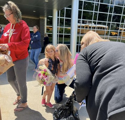 Student pickup & appreciation day for transportation drivers. - Here are two of our drivers picking up two different students from two different schools. One of the schools we’re having an event in the first picture and the second picture was appreciation day for all of the school bus and transportation drivers.