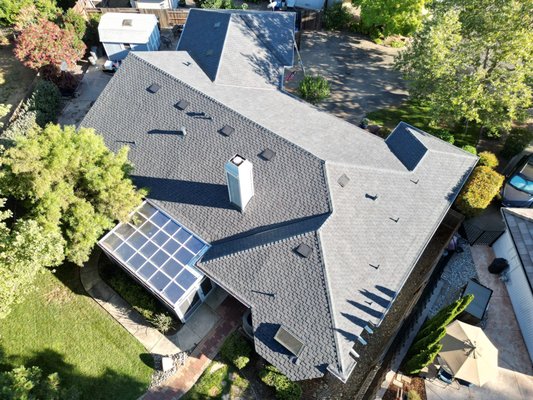 Roof replacement tiles to GAF shingles - Our most recent Presidential roof GAF replacement. Previously tile to Grand Sequoia Shingles in Charcoal. Installed brand new Flashing, Drip Edge, Valley Metals and Trims around Pipes. Also, Ice and Water Shield to the Valleys and Eaves