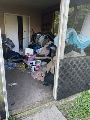 Lanai Clean out - This was a lanai clean out. Customer called and told us that she had some ruined furniture and clothing. Also that there might be a possum. We went and cleaned everything out. We also removed 3 possums from there.