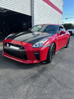 2018 Nissan GTR front bumper Replacement - This vehicle came in for a new model front bumper. Bumper was painted and installed by us.