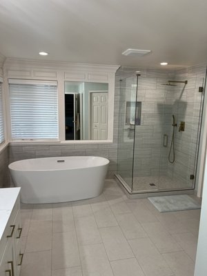 Master and Guest Bathrooms (Multiple Projects) - This remodel was done on an old bathroom that was in need of an upgrade. We took out the old shower, tile flooring, sinks, mirrors and installed tiles in both of the bathroom (floor/shower), installed new cabinets in the bathrooms with under-mount sinks, and quartz counter top, mirrors and new fixtures. The bathroom turned out great with all the new updates that was made and the quality that was offered on this project. Master and Guest Bathrooms (Multiple Projects) - This remodel was done on an old bathroom that was in need of an upgrade. We took out the old shower, tile flooring, sinks, mirrors and installed tiles in both of the bathroom (floor/shower), installed new cabinets in the bathrooms with under-mount sinks, and quartz counter top, mirrors and new fixtures. The bathroom turned out great with all the new updates that was made and the quality that was offered on this project.