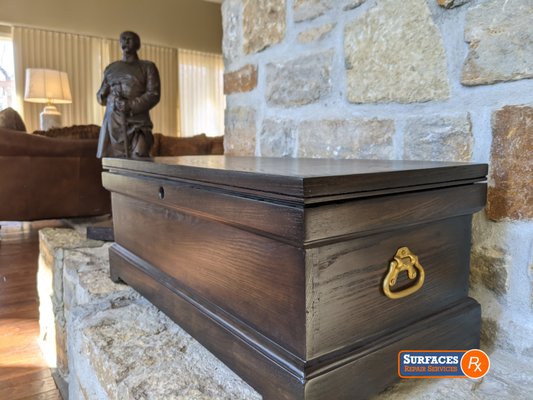 The Dog Ate the Antique Chest. Surfaces Rx creates a one-of-a-kind collectable. - The owner's puppy chewed on all the corners of this 100-year old antique chest built by his grandfather in early 1900's. Surfaces Rx stripped off the old finish inside and out, repaired all the damage, then we hand sanded the piece, before applying stains to highlight the beautiful grains and a smoky antique look around the edges. This project took about 40 hours to complete. The Dog Ate the Antique Chest. Surfaces Rx creates a one-of-a-kind collectable. - The owner's puppy chewed on all the corners of this 100-year old antique chest built by his grandfather in early 1900's. Surfaces Rx stripped off the old finish inside and out, repaired all the damage, then we hand sanded the piece, before applying stains to highlight the beautiful grains and a smoky antique look around the edges. This project took about 40 hours to complete.