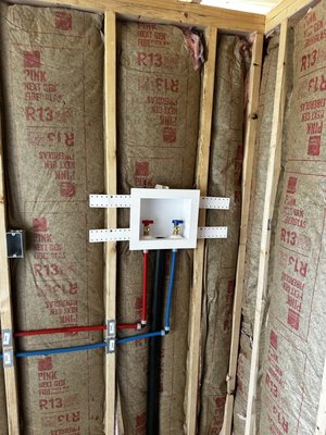 Washer box repipe - This re-pipe was done after the homeowner had a friend run the water lines and drain for his washer box. The venting was missing completely, and the drain was too small and was missing the p-trap.