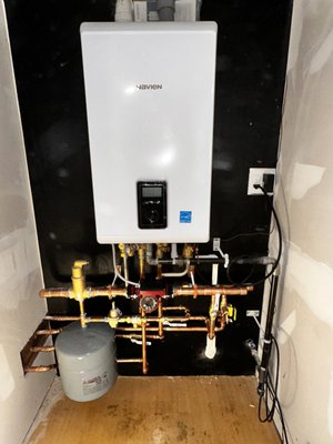 Alexandria Remodel. Complete plumbing and heating systems. - This was a complete gut with an all new plumbing and heating system and new gas service. Heat and hot water is provided by a Navien combi-boiler.