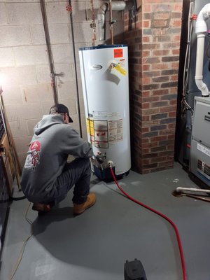 Water Heater Install - Completed a water heater installation and setup. The old unit was removed and the new water heater was set in place with proper positioning and clearances. We connected hot and cold water supply lines, installed and verified shutoff functionality, and confirmed the routing and support of the piping. Venting connections were inspected and secured as part of the final setup.

After installation, we performed a full operational check including leak inspection at all connection points, verification of valve operation, and confirmation that the unit was heating and functioning as expected. Photos document the installation steps, supply and vent connections, and the finished placement of the new water heater for record keeping.