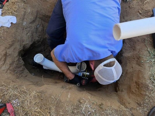 sewer cleanout installation - This project started as a sewer back up. Home was not equipped with sewer cleanout access. We were able to expose main sewer line and install two-way cleanouts for proper access and service.