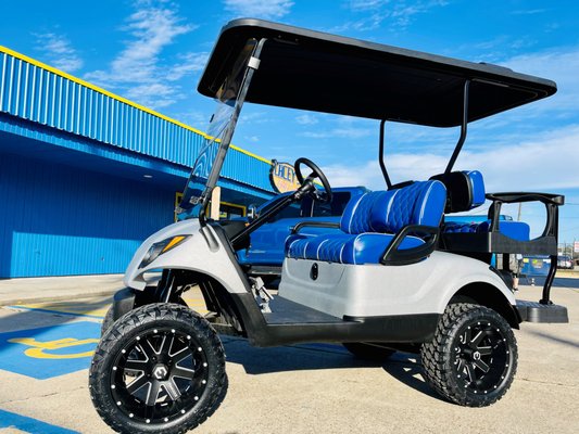Golf Cart Rebuild - This cart came used, straight from the golf course. We reupholstered the seats, painted the body, all new street legal kit: headlights, taillights, turn signals, mirrors, horn, seatbelts, new fold-down windshield, plus new tires and wheels. Came out to be a super nice cart. Golf Cart Rebuild - This cart came used, straight from the golf course. We reupholstered the seats, painted the body, all new street legal kit: headlights, taillights, turn signals, mirrors, horn, seatbelts, new fold-down windshield, plus new tires and wheels. Came out to be a super nice cart.