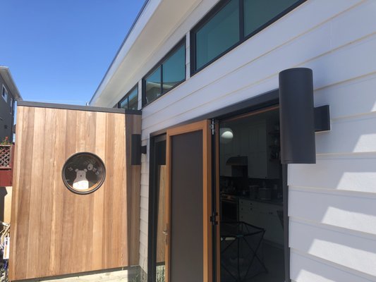 Tiny house and main house remodel - A 470 sq.ft. space to host visiting family members and art classes, complete with high quality compact kitchen and bathroom. We designed the tiny house first, then remodeled the main house with finishes to match the ADU in the second phase of this project. Tiny house and main house remodel - A 470 sq.ft. space to host visiting family members and art classes, complete with high quality compact kitchen and bathroom. We designed the tiny house first, then remodeled the main house with finishes to match the ADU in the second phase of this project.