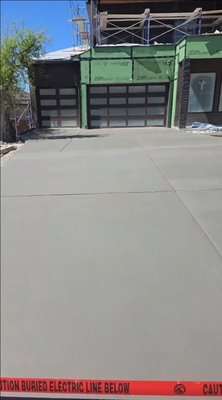 Jonestown Driveway, walkway, and sidewalk - This beautiful new build in Jonestown Texas is finally coming together woth the addition of a new 4 car driveway leading to 2 car parking garage. We installed a paver style walkway leading from driveway to front door, and a brand new sidewalk leading across entire front lot.