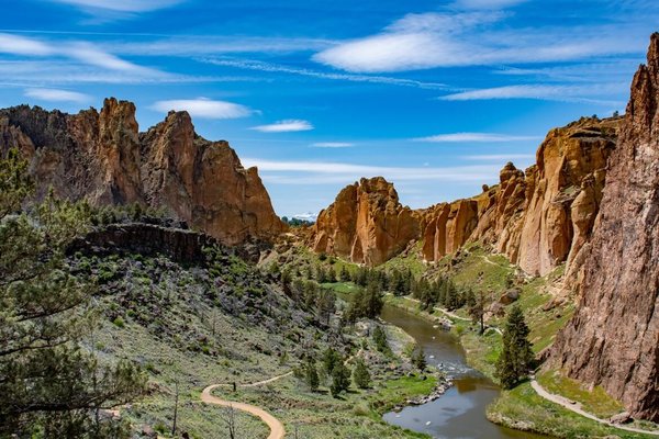 Hiking in Smith Rock State Park - Hiking in Smith Rock State Park
109/person    3 hours  (Not including 30 minutes transportation time each way)

Join us to hike this magical area with breathtaking views at every turn.  Get ready for some stunning rock formations, incredible views of the Crooked River and admiring the numerous mountain climbers hundreds of feet in the air.

This will be an intimate group (limit 4 people) so that we can maximize our time in these beautiful surroundings.  Depending on the consensus of the group, we will hike roughly 2 to 2.5 hours via either Misery Ridge Trail (a moderate hike with a fairly challenging first 35 minutes) OR we can choose more of a flatter route meandering along the river.

What is Included from ATB:

Transportation
Park Fee
Lunch
Beverages
What ATB suggests you bring:

Sunscreen
Layers (weather can change quickly in Central Oregon))
Hiking shoes (more important for the Misery Ridge Trail)
Note: Tour duration does not include 30 minutes transportation time each way