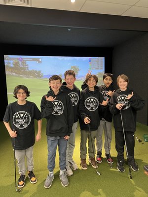 Birthday Party - At Dogleg Golf, we recently hosted an unforgettable birthday party for a group of energetic 13-year-olds. From start to finish, it was a blast! The kids had exclusive access to our entire facility, where they enjoyed grooving to their favorite tunes on a customized playlist. Our three Trackman simulators kept the excitement going with a variety of golf modes, including driving range practice, full courses, and fun mini-games. It was a joy to see them having so much fun and creating lasting memories. Looking to celebrate a special occasion? Let Dogleg Golf make it an event to remember!