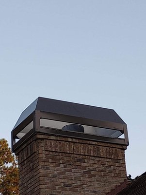 Windshield - This chimney chase had a older cover on it that was rusted and causing water intrusion. We replaced it with a beautiful Chase cover and windshield.