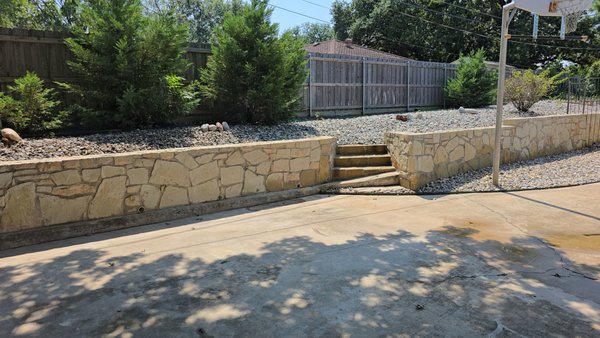Retaining Wall Replacement 2025 - This client in Hurst had an old, rotting railroad tie retaining wall. We removed the old retaining wall and replaced it with a new Milsap stone retaining wall.