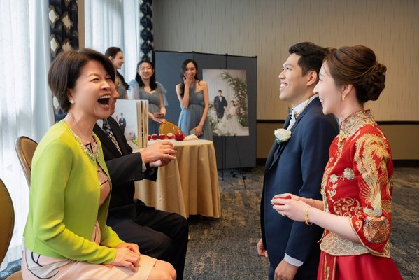Chinese Wedding - Betrothal & Gift Exchange (过大礼 Guo Da Li) – Sometimes simplified or done privately; symbolic gifts (tea, wine, jewelry, red envelopes) are exchanged between families.
Bride Pickup & Door Games – On the wedding day, the groom and groomsmen arrive at the bride’s home or hotel suite. Bridesmaids play playful “door games” to test the groom before letting him in.
Tea Ceremony (敬茶) –
Couples serve tea to parents and elders to show respect and receive blessings and red envelopes.
Usually held at home, a hotel suite, or a banquet venue’s private room.
Attire –
Bride: Red qipao or cheongsam for the tea ceremony; often changes into a white Western gown later.
Groom: May wear a changshan (long tunic) or a modern suit with a red tie or boutonnière.
Banquet Reception –
Hosted at Chinese banquet restaurants or hotels in areas like Monterey Park, Arcadia, or San Gabriel Valley.
Multi-course seafood or banquet menus, lion dances, and karaoke are common.
Couples sometimes do multiple outfit changes.
Symbolic Décor & Customs – Double Happiness (囍) characters, red and gold color scheme, firecrackers or confetti, and sometimes a roast pig presentation. Chinese Wedding - Betrothal & Gift Exchange (过大礼 Guo Da Li) – Sometimes simplified or done privately; symbolic gifts (tea, wine, jewelry, red envelopes) are exchanged between families.
Bride Pickup & Door Games – On the wedding day, the groom and groomsmen arrive at the bride’s home or hotel suite. Bridesmaids play playful “door games” to test the groom before letting him in.
Tea Ceremony (敬茶) –
Couples serve tea to parents and elders to show respect and receive blessings and red envelopes.
Usually held at home, a hotel suite, or a banquet venue’s private room.
Attire –
Bride: Red qipao or cheongsam for the tea ceremony; often changes into a white Western gown later.
Groom: May wear a changshan (long tunic) or a modern suit with a red tie or boutonnière.
Banquet Reception –
Hosted at Chinese banquet restaurants or hotels in areas like Monterey Park, Arcadia, or San Gabriel Valley.
Multi-course seafood or banquet menus, lion dances, and karaoke are common.
Couples sometimes do multiple outfit changes.
Symbolic Décor & Customs – Double Happiness (囍) characters, red and gold color scheme, firecrackers or confetti, and sometimes a roast pig presentation.
