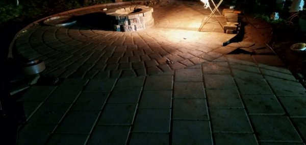 Paver Patio and fire pit 2020 - Paver patio walkway from back deck leads to a circular patio and fire pit, additionally, outdoor outlets were installed. Project was completed in phases. Paver Patio and fire pit 2020 - Paver patio walkway from back deck leads to a circular patio and fire pit, additionally, outdoor outlets were installed. Project was completed in phases.