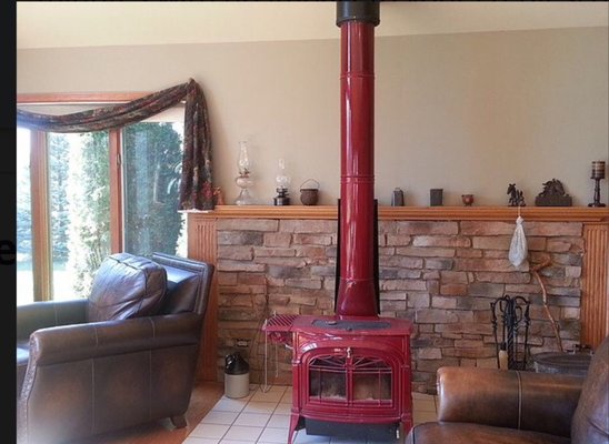 Fireplace remodel - This project consisted of removing an old free standing wood burning stove and working with a fireplace company who installed a gas fireplace. I then completed the project by building a stone veneer surround with a reclaimed barn wood mantle to better fit the style of the house. Fireplace remodel - This project consisted of removing an old free standing wood burning stove and working with a fireplace company who installed a gas fireplace. I then completed the project by building a stone veneer surround with a reclaimed barn wood mantle to better fit the style of the house.