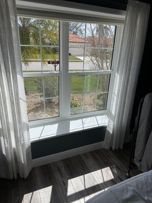 Window Apron - Installed new finished plywood after a new window was installed.  Added trim around the window. Painted the inside of the opening.