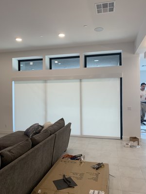 Zebra Shades and Roller Shade Installed over a 14FT. Sliding Door! - This install was done in a brand new home up in Summerlin, Las Vegas!    The install is a mix of Roller Shades and Dual Banded Zebra shades!  The larger shades are motorized and the smaller shades are cordfree!