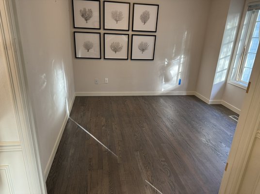 Hardwood Floor Remodel - Bothell - Hardwood Floor Remodel. Red Oak Hardwoods w/ a Warm Grey stain. Demoed old carpet & trim, installed new Red Oak hardwoods, sanded hardwoods, applied Warm Grey stain, applied finish coat, installed new trim.