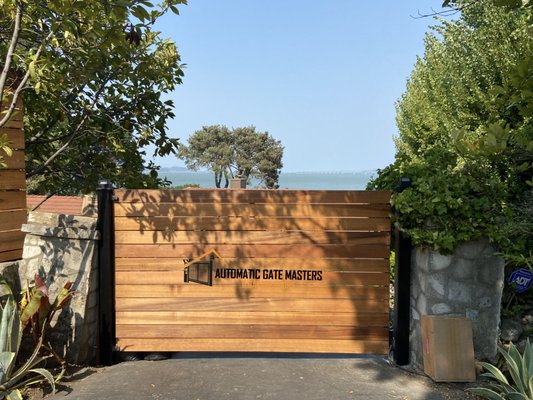 Automatic Gate In Tiburon, CA - We Recently Installed A New Single Swing Gate In Tiburon, CA We Used A Powder Coated Metal Frame And 1"x6" Premium Cedar Wood Planks To Provide Privacy And Security To Our Satisfied Clients! Automatic Gate In Tiburon, CA - We Recently Installed A New Single Swing Gate In Tiburon, CA We Used A Powder Coated Metal Frame And 1"x6" Premium Cedar Wood Planks To Provide Privacy And Security To Our Satisfied Clients!