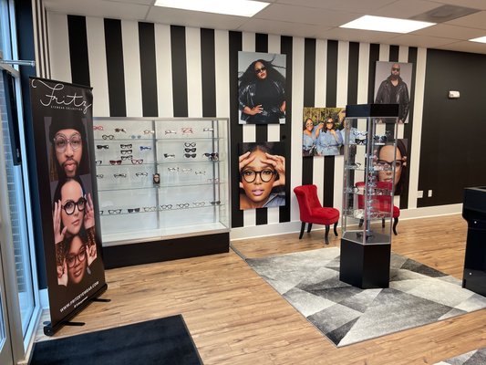 Fritz Eyewear - This was a renovation of Fritz Eyewear in Greer, South Carolina. We repainted the store, assembled all of the display shelving for the eyewear and check stand. We concealed the cables for the check stand. We Installed all of the artwork, decor, and wall shelving. We assembled and staged the main office, bathroom, as well as the work room. We mounted 2 TVs.