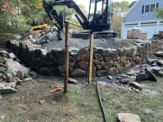Fieldstone Wall - Homeowner wanted to match his existing fieldstone walls and put a shed on the property.