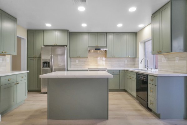 Covina Kitchen Remodel 2025 - We love trying new color ways in our kitchen remodels and this was the first time in a long time we did something in the green color family! This was a complete kitchen remodel with new cabinets, flooring, and a tile backsplash!