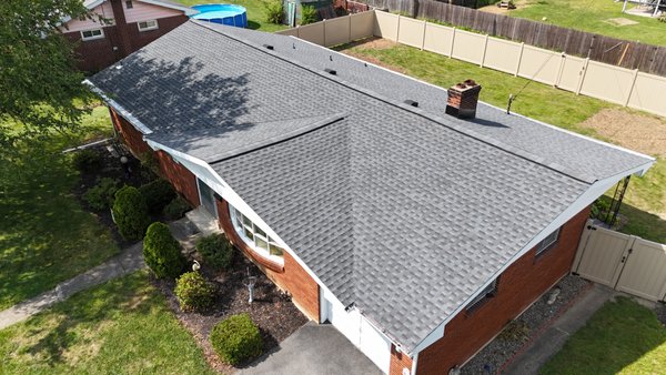 Roof & Gutter Replacement - Allentown, PA - We transformed this home in Allentown, PA, with a complete roof replacement using Pewter Gray GAF Timberline HDZ shingles for a sleek, durable, and modern look. Along with the roof, we replaced the gutters, ensuring the home's exterior is not only beautiful but also equipped for superior water management. This project highlights our commitment to quality craftsmanship and attention to detail, leaving the homeowner thrilled with the results!