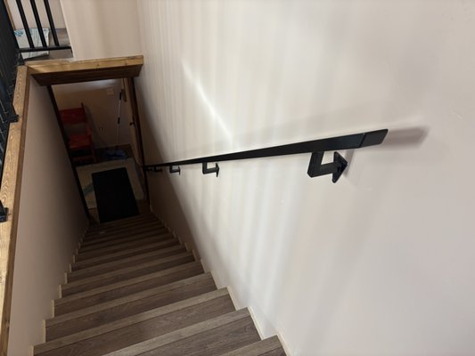Custom hand rails - This job was for a customer up north. He added an addition to his house and needed a stair hand rail and a stair safety rail. This was TIG welded and powder coated semi gloss black.
