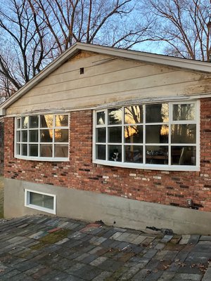 “California Bungalow” - This home was original and lasted more than 50 years. However inefficient windows and deteriorating siding called us for help.
