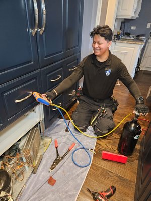 Subzero compressor repair - Nain preparing to replace the compressor in a Sub Zero refrigerator Subzero compressor repair - Nain preparing to replace the compressor in a Sub Zero refrigerator
